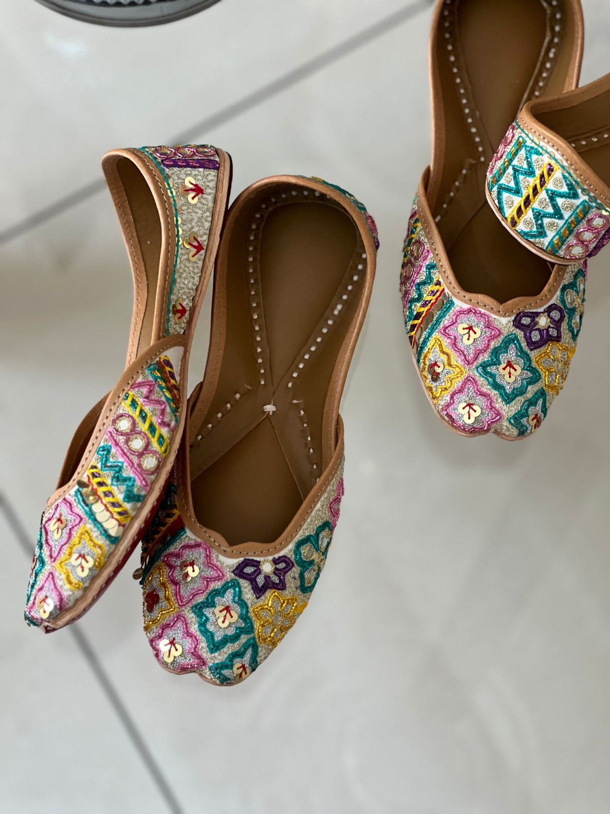 embroidered juttis women
handcrafted ethnic juttis India
lightweight juttis women
everyday ethnic footwear
comfortable juttis women